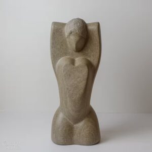 Limestone sculpture "Unfurling Goddess" carved in Indiana limestone in 2016. Frontal view.