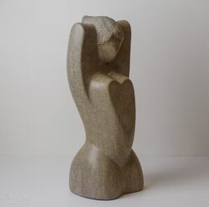 Limestone sculpture "Unfurling Goddess" carved in Indiana limestone in 2016. Three quarters view (right).