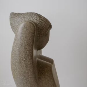 Limestone sculpture "Unfurling Goddess" carved in Indiana limestone in 2016. Detail of the head.